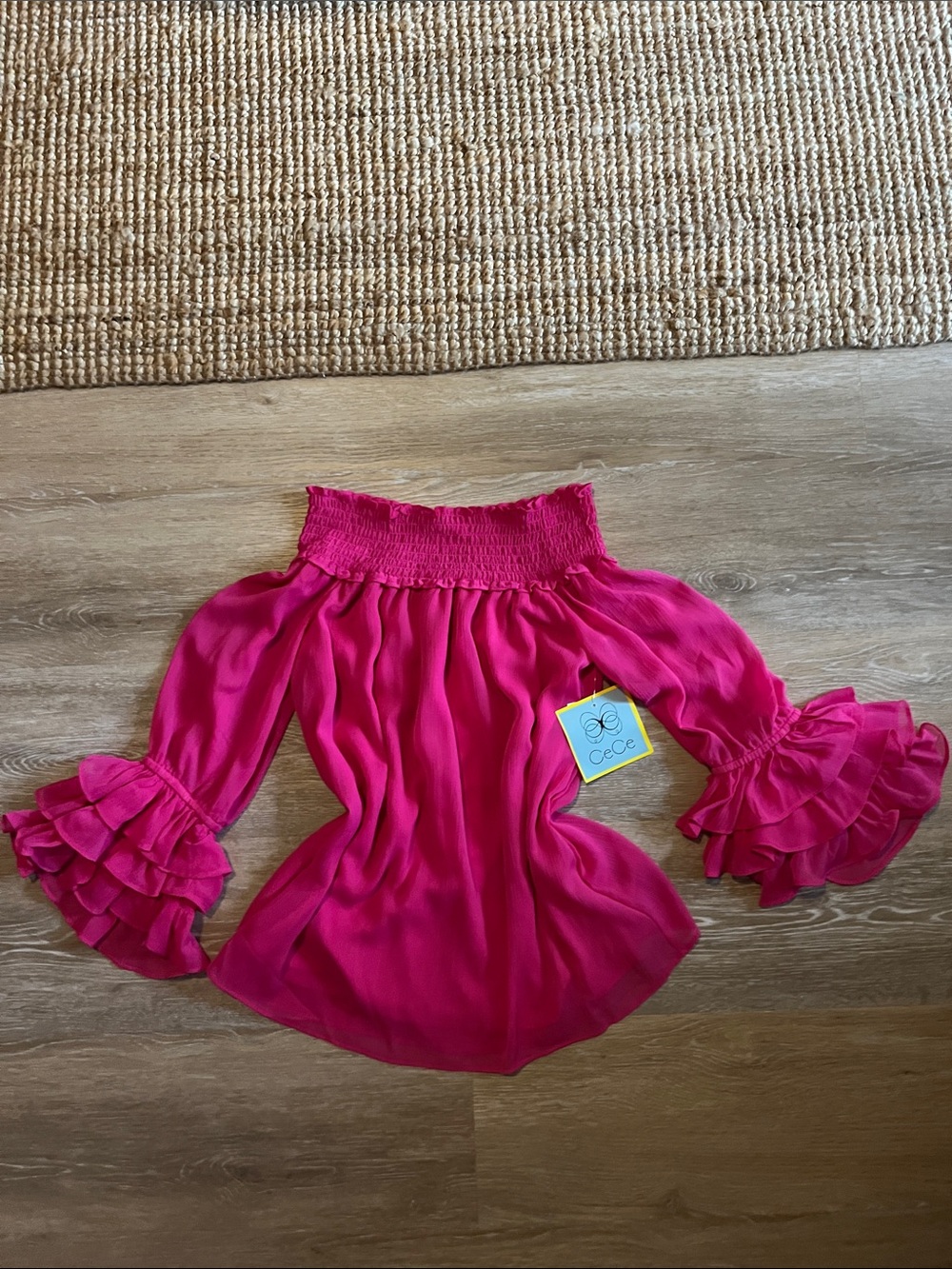 CeCe Off-Shoulder Ruffle Bell Sleeve Blouse in Fuchsia Pink